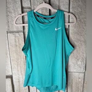 Nike Dri-fit, teal/turquoise workout tank. Size Medium, barely worn.